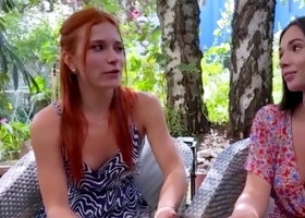 Redhead honey and dark-haired smooch in public
