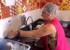 Senior female gets into the enormous pipe of the towel man